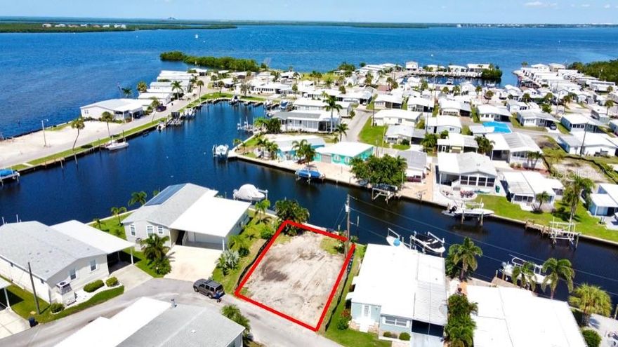 Canal-Front Vacant Lot in Tropic Isles 55+ Community!
Here’s your chance to own a piece of paradise in Tropic Isles, a premier 55+ resident-owned waterfront community in Palmetto, FL. This canal-front lot offers direct water access—perfect for boating, fishing, or simply soaking in the peaceful views. Private dock needs to be repaired. $338 monthly fee covers water, trash, recycling, sewer, park management and access to amenities.  Tropic Isles features a full-service marina, boat launch, pool and spa, clubhouse, fitness center, and a full calendar of activities. Whether seasonal or year-round, this is your opportunity to create your perfect Florida lifestyle on the water.