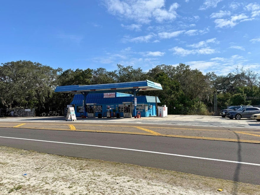 This offering includes the real estate, land, established business, and operational gas station—being sold as one comprehensive package. HIGH-VISIBILITY COMMERCIAL HUB ON ALT-19 – CLEAN ENVIRONMENTAL REPORT. Excellent opportunity to own a high-traffic, income-producing asset on the bustling South Pinellas Avenue corridor in Tarpon Springs. This versatile property features three fuel pumps, a functional automotive service garage, and a retail/office component, offering multiple revenue streams in one location. INVESTOR CONFIDENCE: The property has undergone recent environmental testing and features a CLEAN report, providing significant peace of mind and streamlining the financing process. Zoned C-2, the site supports a wide range of commercial uses, making it attractive for owner-operators or investors seeking long-term upside in a high-demand area. With prominent pole signage and a high daily traffic count, the location ensures consistent exposure for both local and pass-through customers. The building features durable block construction and ample parking for up to 30 vehicles. Secure a verified, move-in-ready commercial location at a compelling price point on one of Tarpon Springs' most active thoroughfares.