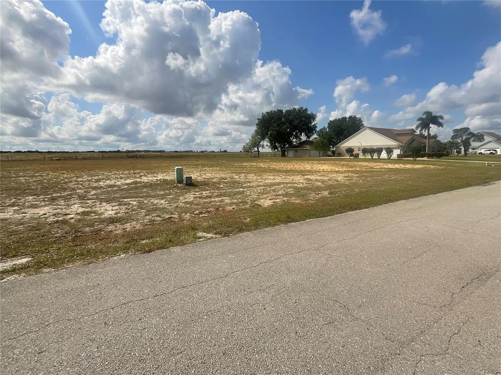 Photo of 547 Sunset Pointe Drive, Lake Placid, FL 33852 (MLS # C7510459)