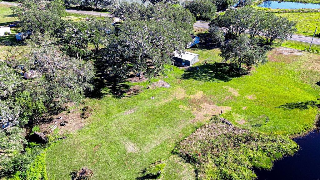 Photo of 1406 E Knights Griffin Road, Plant City, FL 33565 (MLS # TB8328427)