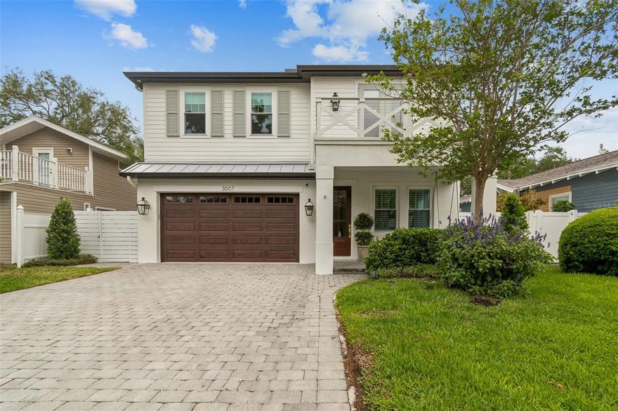 If you believe the little things make all the difference, this beautifully crafted 2022 home is sure to impress. Tucked just one block from Bayshore Boulevard in the highly desirable Bayshore Beautiful neighborhood, this is a rare chance to enjoy newer construction in one of South Tampa’s most iconic locations.
From the moment you pull up, the paver driveway, glowing gas lanterns, welcoming front porch, and charming second-story balcony create instant curb appeal. Inside, the home continues to deliver with a thoughtful layout featuring 5 bedrooms and 5 full bathrooms, including a convenient first-floor guest suite—ideal for visitors or multi-generational living.
The entry sets a warm and refined tone with plantation shutters and leads into a dedicated living room or formal dining room before opening up to a light-filled kitchen, breakfast nook, and living area designed for gathering and entertaining. The kitchen is a standout, complete with a large quartz island, farmhouse sink, built-in buffet, GE stainless steel appliances, 36” gas cooktop, walk-in pantry, beverage center and large buffet—everything you need, right where you want it.
Step outside to a covered and screened in lanai equipped with a large ceiling fan overlooking a fully fenced backyard with custom landscaping, pavers and stone pizza oven—perfect for weekend gatherings or relaxed evenings at home.
Upstairs, four generously sized bedrooms each feature walk-in closets and access to full baths. The spacious laundry room is both functional and stylish with new shelving and a high-end LG washer and dryer. The primary suite offers a peaceful retreat with dual vanities, a freestanding soaking tub, a separate shower, and an oversized walk-in closet.
Throughout the home, you’ll find elevated finishes and thoughtful upgrades, including soaring 9’4” ceilings, 8’ doors, smooth-finish walls, low-E impact windows, a tankless gas water heater, and pavered outdoor spaces. Additional highlights include designer ceiling fans in every room, wired for security system with cameras, finished garage storage, a whole-home water filtration and softener system, and custom blinds and plantation shutters.
Located in the highly regarded Roosevelt, Coleman, and Plant school districts, this home offers not only style and comfort but also convenience. Enjoy easy access to South Tampa’s top dining, shopping, and nightlife—just minutes from your doorstep. Call today to arrange a tour.