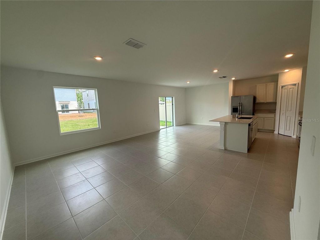 Photo of 4378 River Beacon Boulevard, Davenport, FL 33837 (MLS # O6398510)