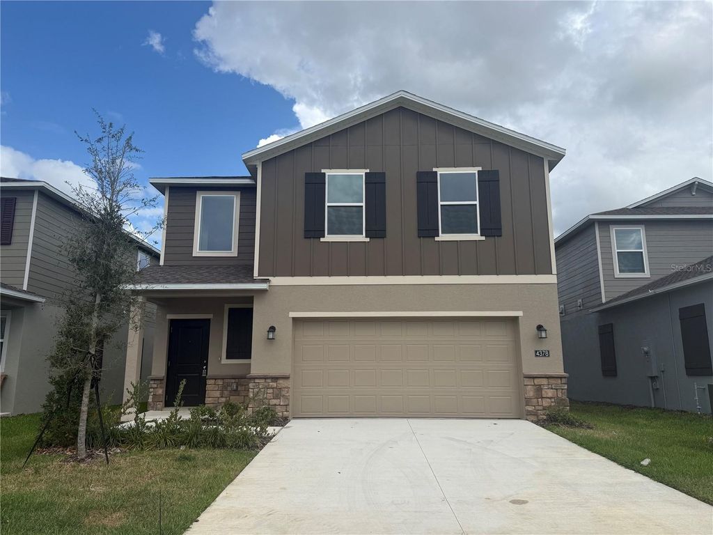 Photo of 4378 River Beacon Boulevard, Davenport, FL 33837 (MLS # O6398510)