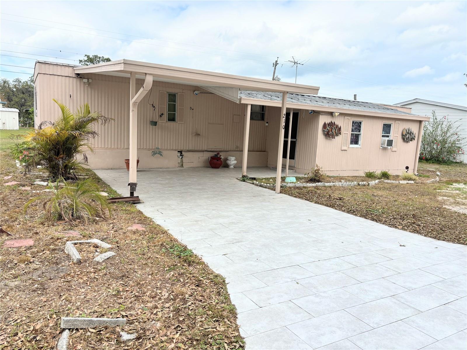 ANOTHER HUGE PRICE REDUCTION! SELLER IS HIGHLY MOTIVATED, ALL OFFERS WILL BE CONSIDERED! This very nice North Lakeland 2 bedrooms 1 & 1/2 bath-Manufactured Home is located in Martin Estates, a 55+ Community. This is the home you have been looking for. You own the land, so there is no lot rent for you to pay. You are only responsible for paying a low monthly maintenance fee of $46.00. You can enjoy the activities at the Community Club House, which includes a pool, laundry room, library, dinners and shuffleboard. Shopping and golf courses are close by. Be sure to schedule your private Showing today before this home is gone!