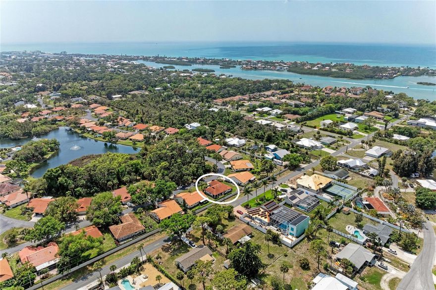 Welcome to your very own coastal retreat in the heart of Nokomis! This 3-bedroom, 2-bathroom home offers a perfect blend of comfort and seaside tranquility, just 1.4 miles from the world-renowned Nokomis Beach and Casey Key. This exclusive residence is move-in ready and designed to impress offering freshly painted bedrooms and a newly updated lanai screen that invites you to relax in style, while the cathedral ceilings and luxurious hardwood floors throughout add a touch of elegance. The master suite is a true sanctuary, featuring the same stunning hardwood floors that flow seamlessly into the guest bedrooms, ensuring every inch of this home radiates quality and charm.

Enjoy peace of mind with a durable tile roof installed in 2019 and a brand-new water heater as of January 2024. Step outside to the expansive lanai, a perfect space for relaxing, entertaining, or simply soaking up the Florida sunshine year-round. The neighborhood welcomes you with mature oak trees lining the entryway, setting the tone for the tranquil lifestyle that awaits. Laurel Hollow is a pet-friendly community with warm, welcoming neighbors and a serene lake complete with fountains—ideal for birdwatching or fishing. Residents also enjoy access to a heated community pool and a cabana overlooking the lake, perfect for gatherings with friends and family.

Located right next to Nokomis Beach and Casey Key, this home offers unparalleled access to the best of coastal living. Walk or bike to the beach in minutes, or explore nearby Venice and Sarasota, both brimming with cultural attractions, boutique shopping, and charming sidewalk cafes. Outdoor enthusiasts will love the proximity to The Legacy Trail, numerous golf courses, and several stunning beaches, including Venice Beach, Manasota Key Beach, and Brohard Beach & Paw Park for your furry friends. Everyday conveniences like Publix, ALDI, Starbucks, banks, pharmacies, restaurants and top-rated schools are just a short walk or drive away.

 Low HOA fees, no CDD fees, and a pet-friendly neighborhood make this a rare opportunity to own your slice of paradise right by the beach. Don’t wait—start living your dream today!