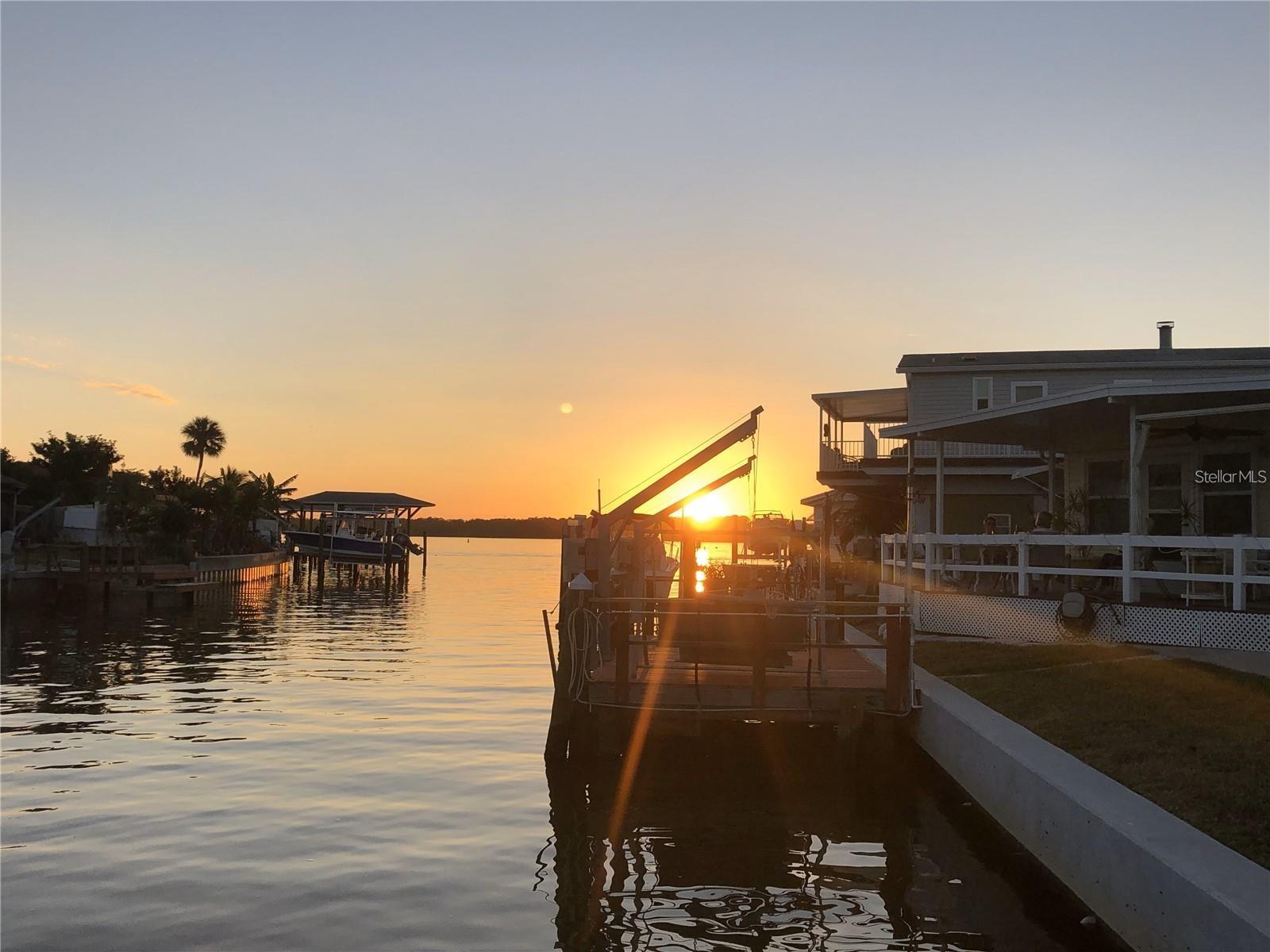 ***Direct Gulf access – no bridges, no tides to contend with** Step out your door and onto your private dock, perfect for launching your boat, fishing, kayaking, paddle boarding, or simply soaking up the sun. Located in a 55+ community. Bring your boat to keep on your own personal dock in your backyard. Just a few lots in on the canal from open water and not a far boat ride to John's Pass. Seawall (which is maintained by community) was redone some years back and is in great shape. **Low HOA fees!** The monthly HOA dues are low at$255/month and include water, sewer, trash, lawn maintenance, along with the community pool & club house! Enjoy all the benefits of community living without breaking the bank. **Stunning views:** Enjoy serene evening sunsets with the gentle sound of the water lapping; it's a waterfront lifestyle waiting for you! Don't miss out on this opportunity!