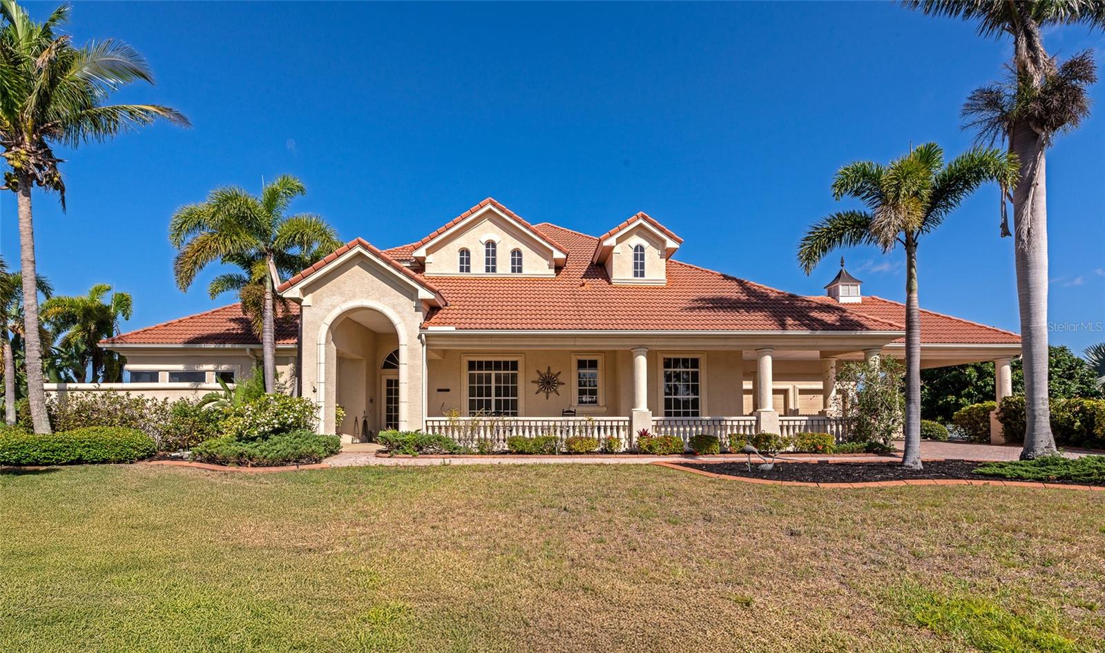 Incredible Price Improvement on this Stunning Waterfront Home with Peninsula Setting & Resort-Style Amenities!
Welcome to this exceptional 3-bedroom, 4.5-bath, 2-story custom home offering 3911 sq ft of luxurious
living space on an oversized 0.89-acre lot—one of the largest in the community! Nestled at the tip of the
peninsula, this rare property boasts 234 feet of saltwater frontage, a private dock featuring a 12,000-pound
lift, and additional freshwater access and dock space. This rare property is truly a boater’s paradise, located
just one canal away from the Manatee River with direct access to the Gulf.
Step inside to soaring cathedral ceilings and an expansive floor plan designed for entertaining. The kitchen
boasts an oversized granite center island, upgraded GE Monogram appliances, overlooking the spacious
living areas. A dedicated office and a versatile loft/gameroom/den provide plenty of flexible space.
Outdoor living is second to none with a huge caged lanai featuring a sparkling pool, relaxing hot tub,
outdoor gas fireplace, outdoor kitchen, and retractable awnings—perfect for hosting gatherings or enjoying
peaceful waterfront sunsets. A paver driveway and lanai add elegance and durability, while a private side
courtyard offers a secluded retreat.
The oversized garage includes a mini-split A/C system for climate-controlled storage or workspace. Enjoy
the convenience of instant hot water, a cul-de-sac location for privacy, and proximity to top-rated shopping,
dining, and world-class beaches.
Discover waterfront living at its finest in the exclusive Harbour Walk community! This sought-after neighborhood offers unparalleled amenities for outdoor enthusiasts and boaters alike. Enjoy a kayak launch for peaceful paddles through scenic waterways. Spend your days exploring the waterfront nature park, complete with serene nature trails, fishing piers, and breathtaking views. Stay active with lighted tennis courts and a playground. Best of all, you’re just moments from direct access to the Gulf—perfect for boating, fishing, and watersports adventures right from your backyard.
This rare gem combines waterfront serenity with luxury upgrades and an entertainer’s dream layout—don’t
miss the opportunity to make it yours! Most furniture is available upon request. Easy to show!