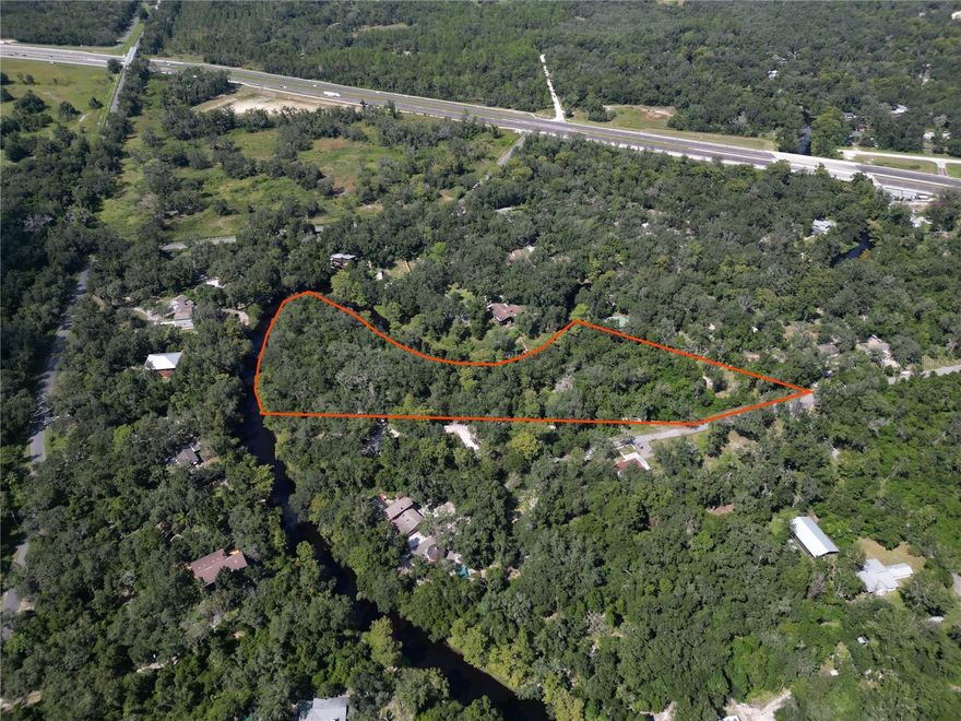Rare Riverfront Opportunity in River Heights Estates – appx 1,120 Feet on the Withlacoochee River

Discover the unmatched beauty and tranquility of River Heights Estates in Dade City, where this exceptional parcel offers approximately 1,120 feet of direct river frontage along the scenic Withlacoochee River an appx 2.48 acres. A true nature-lover’s paradise, this property invites you to design your dream retreat surrounded by Florida’s most captivating landscapes.

Imagine mornings spent casting a line from your own riverbank or launching a canoe or kayak right from your backyard. Whether you’re building a fishing retreat, a weekend getaway, or a full-time riverfront escape, this homesite provides endless possibilities.

Outdoor adventure is never far away. The property is located near the Withlacoochee State Trail, perfect for biking and hiking, and close to the Croom and Cypress Lakes Preserves, offering miles of trails, wildlife viewing, and natural beauty. Serene setting yet convenient to Dade City amenities

Whether you’re seeking a private weekend hideaway or envisioning a custom riverfront residence, this rare stretch of waterfront land is your chance to live the Florida lifestyle at its most peaceful and natural.