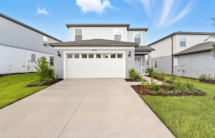 Move in Ready Available NOW!! Enjoy all the benefits of a New Construction Home in the Pulte Homes community of Silverlake, ideally located in Lake Alfred, FL, just minutes from I-4 and US-17. This community provides easy access to Lakeland and the Greater Orlando Area and will offer resort-style amenities, including a covered cabana clubhouse, pool, playground, and more. Plus, this community is Water Start Certified, so you’ll enjoy monthly energy savings!
This two-story Hamden home design showcases an open-concept floor plan with 18”x18” tile flooring in the main living areas, bathrooms, and laundry room, stain-resistant carpet in the bedrooms, and ripped pine luxury vinyl plank on the stairs and upstairs hallway. The kitchen features an island, a large double-bowl undermount sink, and Whirlpool stainless steel appliances, including a dishwasher, microwave, refrigerator and range.
Designer white cabinets and quartz countertops are in the kitchen and bathrooms. Additional features include a covered lanai, a convenient 2nd-floor laundry room, whole house blinds, LED downlights in the gathering room, two tone paint color throughout, 2-car garage and a Smart Home technology package with a video doorbell. 
Enjoy peace of mind with Pulte’s transferable, 10-year Limited Structural Warranty that covers materials and workmanship in the 1st year, workability of plumbing, electrical, HVAC, and other mechanical systems through the 2nd year, various types of water infiltration and internal leaks through the 5th year, and the structural integrity of the home through the 10th year. Plus, we’re currently offering limited-time incentives and below-market rates!