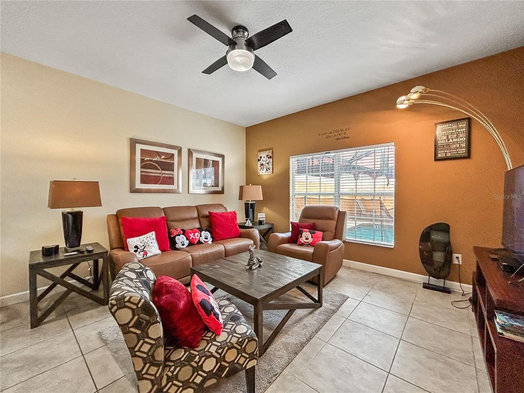 Photo of 8960 Majesty Palm Road, Kissimmee, FL 34747 (MLS # O6398289)