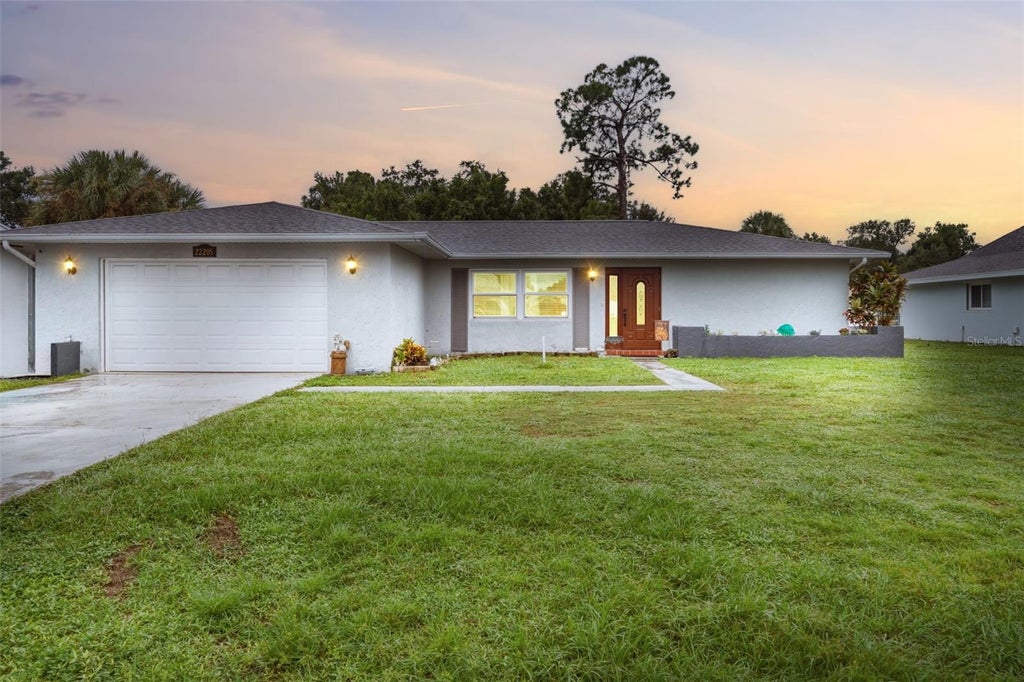 Photo of 22205 New York Avenue, Port Charlotte, FL 33952 (MLS # C7532050)