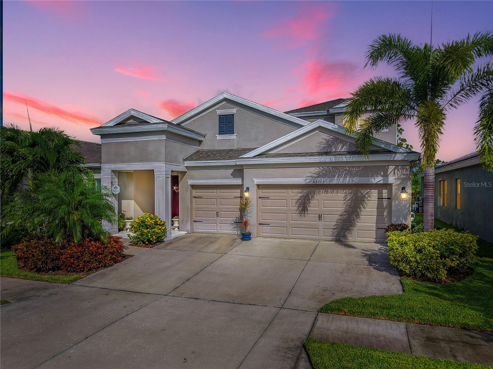 Welcome to this stunning residence located in the highly sought-after WaterSet community, where elegance meets modern convenience. Step inside to find beautiful granite countertops, crown molding, and plantation shutters that bring timeless charm to every room. The open layout is enhanced by soaring vaulted ceilings, creating a light and airy atmosphere throughout. Upstairs, a spacious bonus room offers the perfect retreat for a home office, playroom, or media space.
This home was designed for both comfort and functionality, featuring a three-car garage for ample storage and parking. Enjoy lower electrical payments with solar panels! Outside, enjoy peaceful views from the large screened-in lanai, surrounded by thoughtful landscaping and backing to private conservation for added serenity. Gutters and other details add to the ease of maintenance, ensuring every detail has been considered.
Located in WaterSet, you’ll have access to exceptional community amenities, including pools, trails, parks, and more—all within minutes of shopping, dining, and top-rated schools. This home combines refined finishes with an unbeatable location, offering the perfect Florida lifestyle.