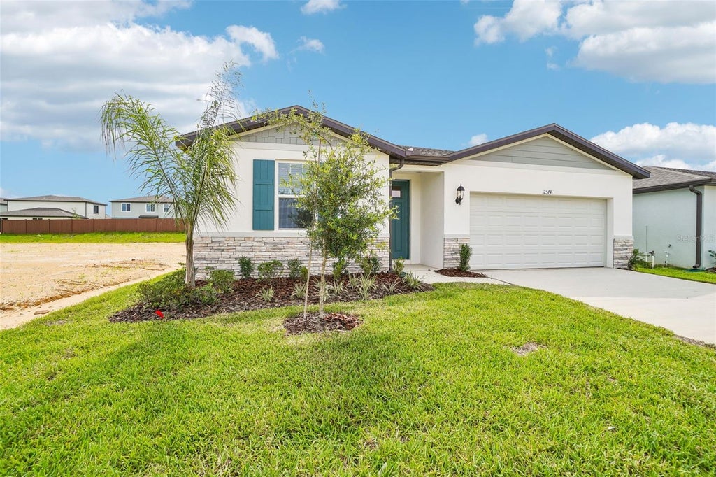Photo of 12574 Hourglass Way, Dade City, FL 33525 (MLS # TB8501394)
