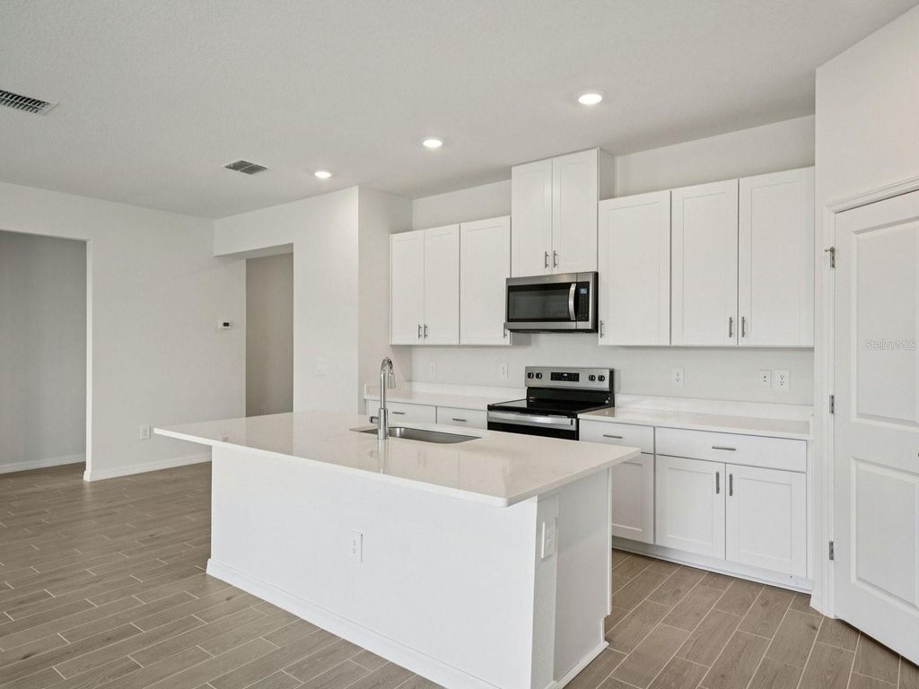 Photo of 12574 Hourglass Way, Dade City, FL 33525 (MLS # TB8501394)