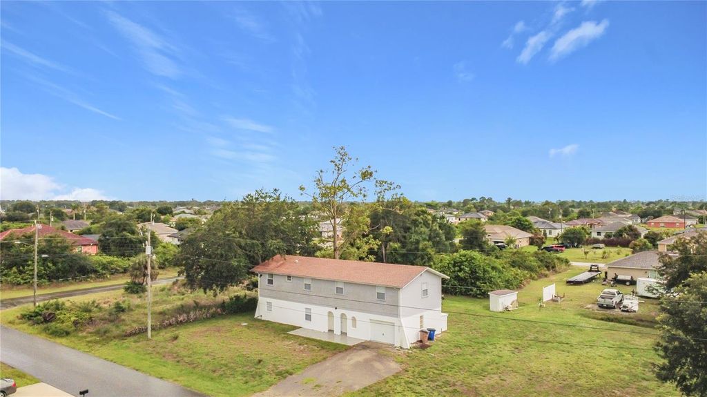 Photo of 3303 6th Street SW, Lehigh Acres, FL 33976 (MLS # O6424869)