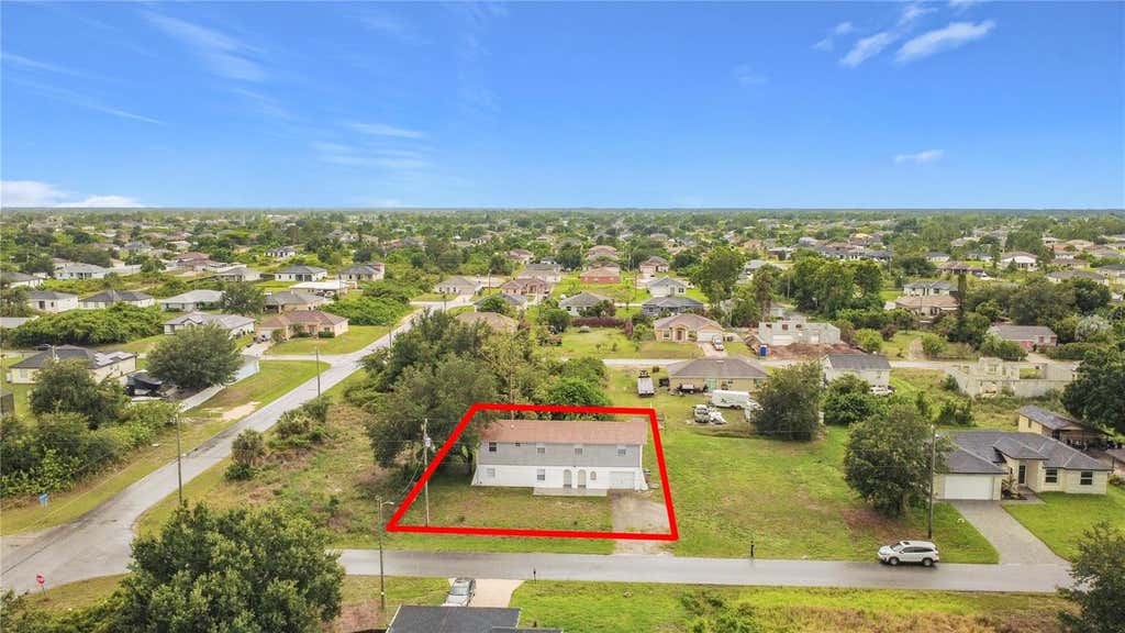 Photo of 3303 6th Street SW, Lehigh Acres, FL 33976 (MLS # O6424869)