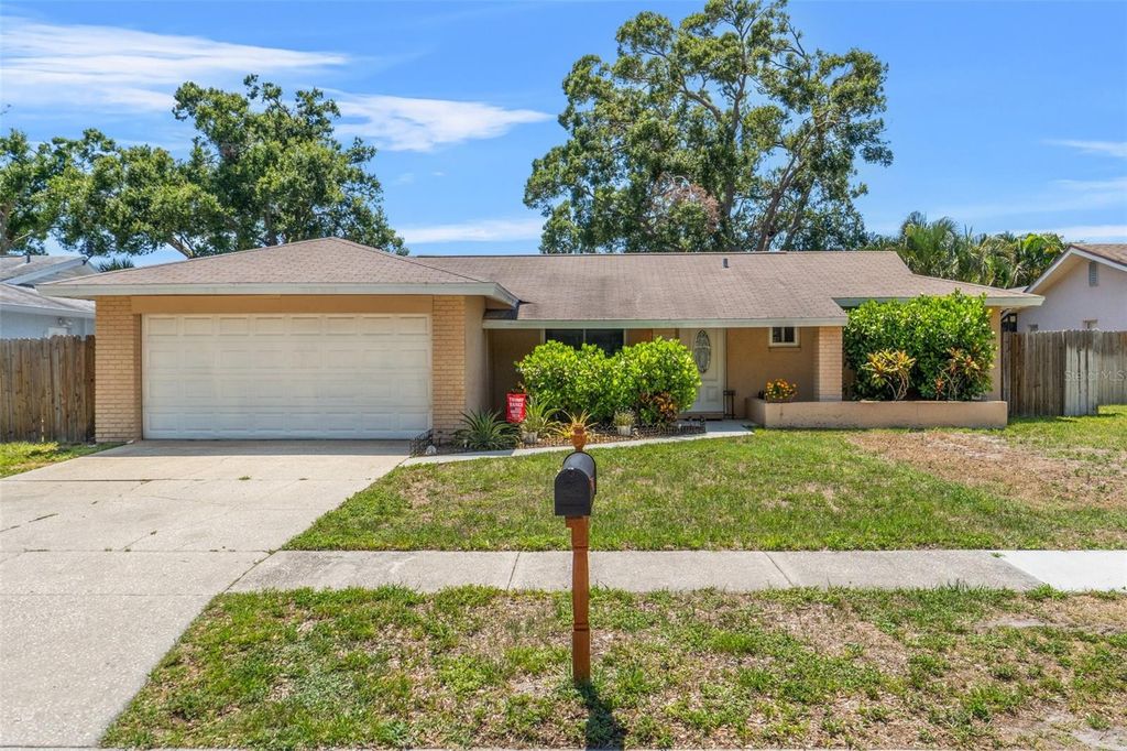 Photo of 6656 Pinecrest Lane N, Pinellas Park, FL 33781 (MLS # W7875906)