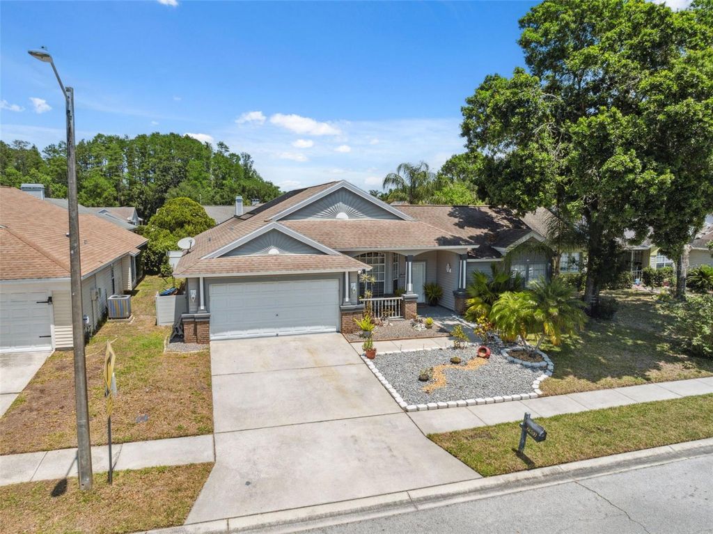 Photo of 7903 Lake Placid Lane, Trinity, FL 34655 (MLS # TB8381206)