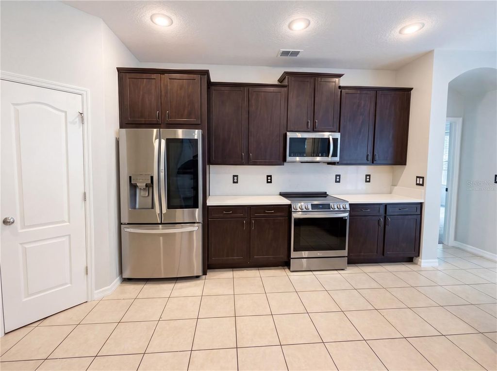 Photo of 619 Errol Parkway, Apopka, FL 32712 (MLS # O6411262)