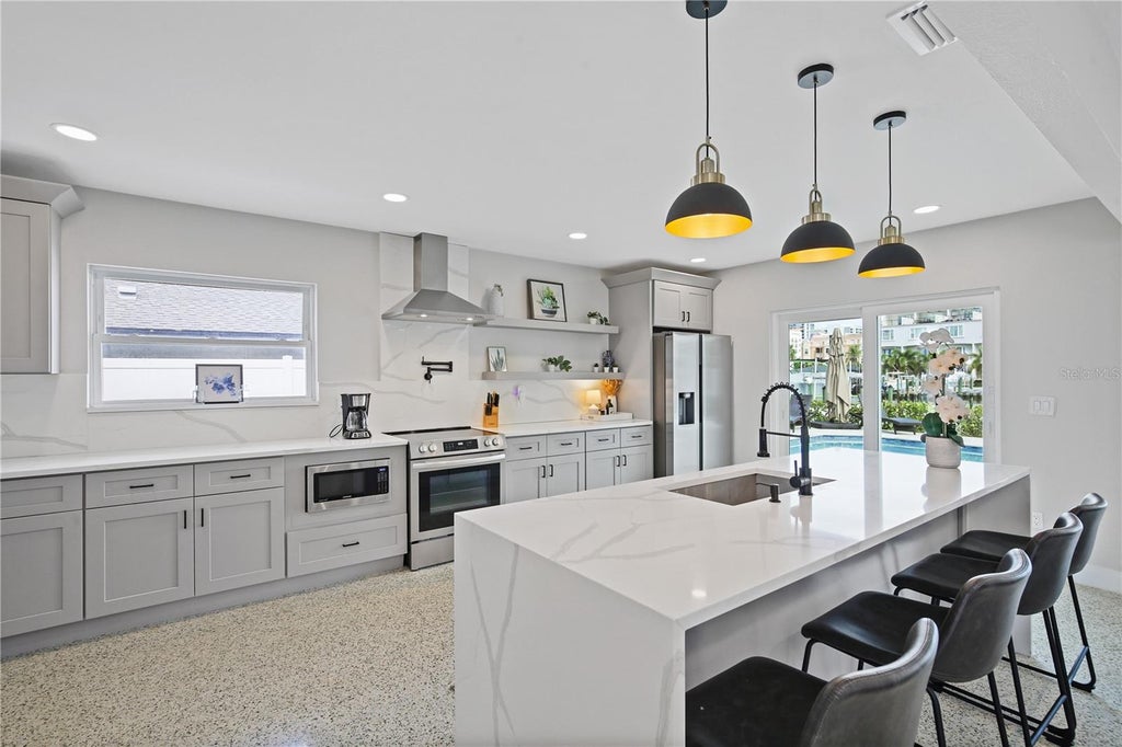Photo of 136 Bayside Drive, Clearwater, FL 33767 (MLS # TB8549679)