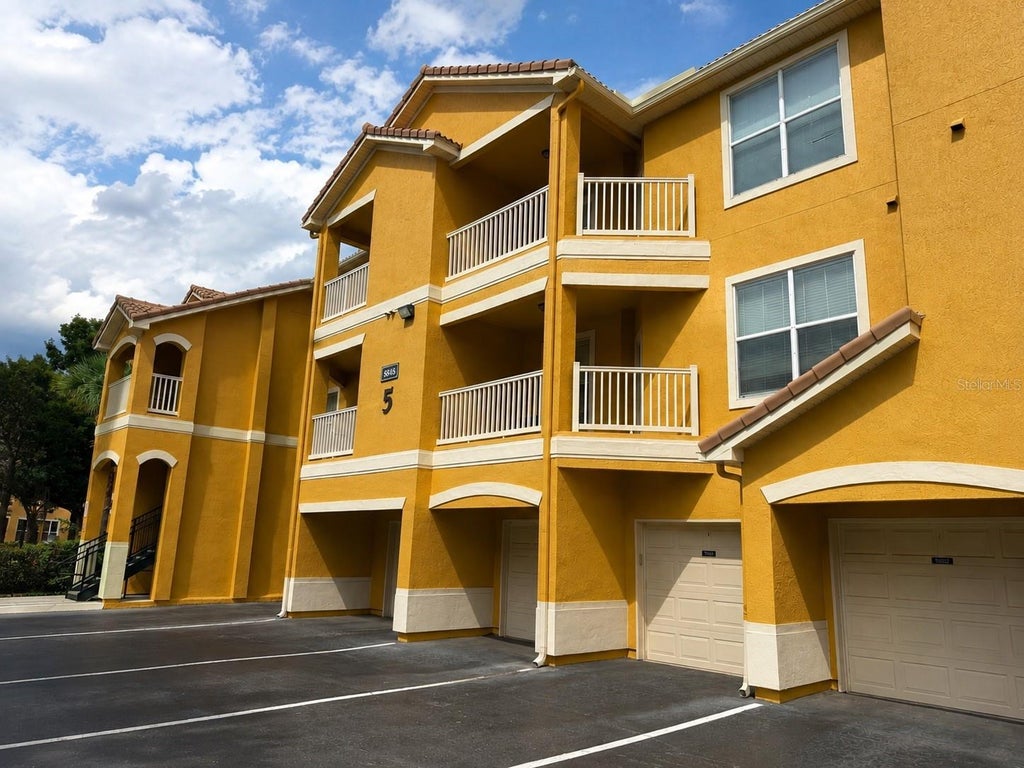 Photo of 8848 Villa View Circle #207, Orlando, FL 32821 (MLS # O6432969)