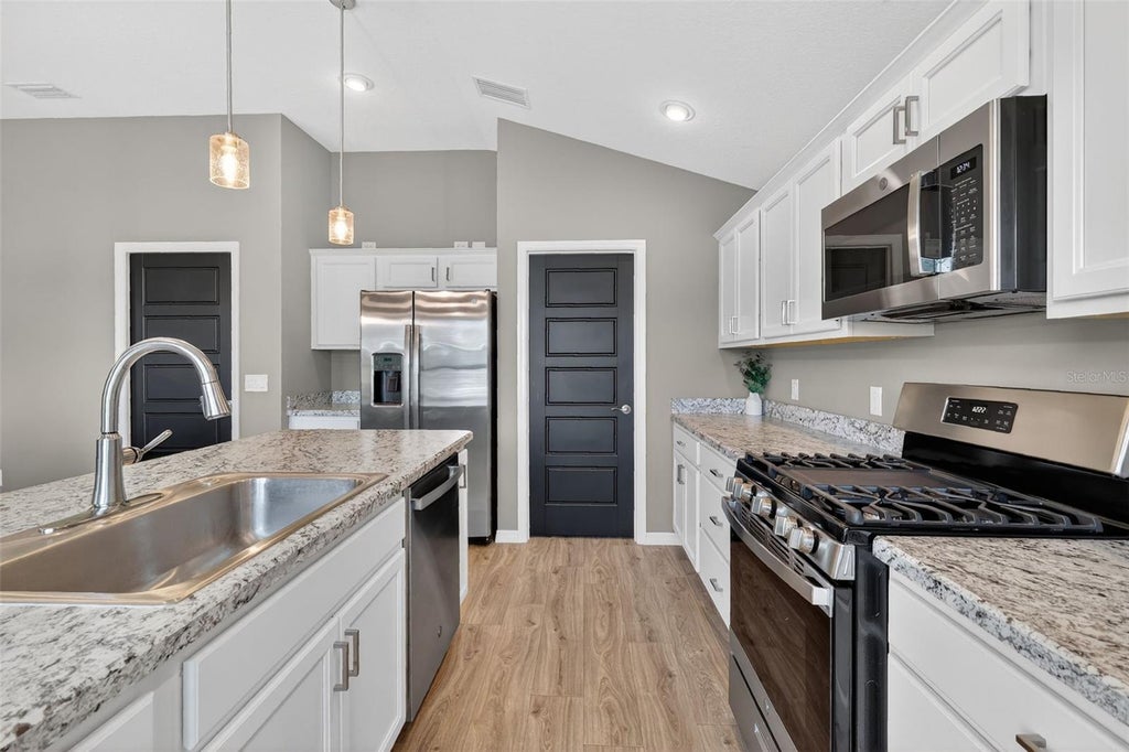 Photo of 2493 Lightbody Lane, The Villages, FL 32163 (MLS # TB8495134)