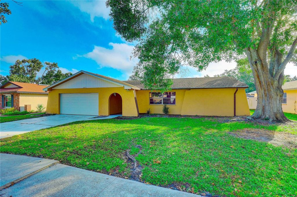 Photo of 2977 Palmetto Court, Dunedin, FL 34698 (MLS # TB8443000)