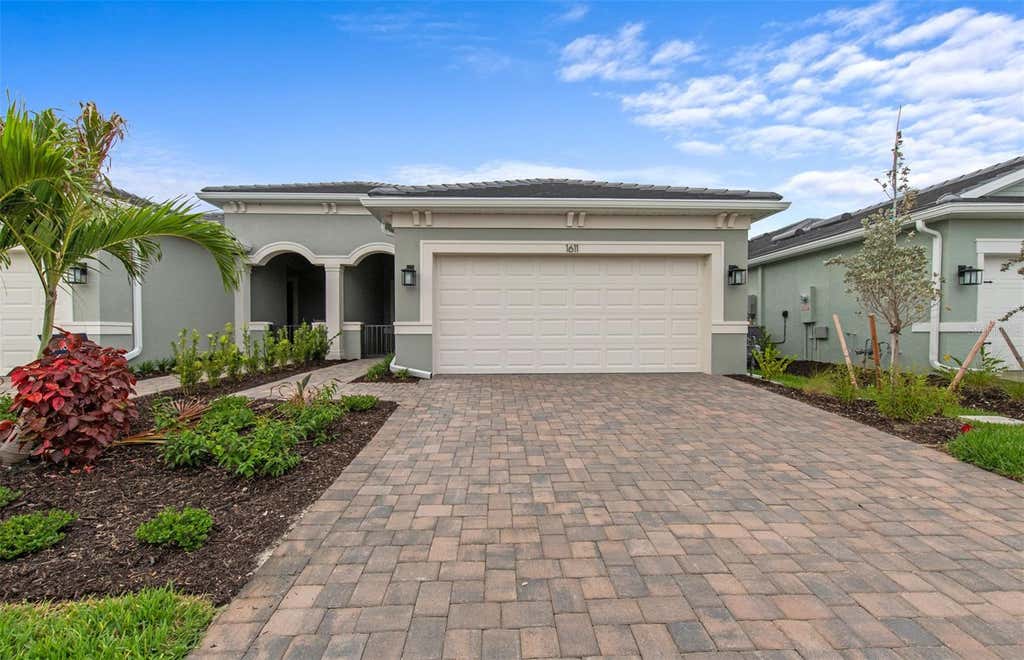 Photo of 1611 Tavira Place, Englewood, FL 34223 (MLS # TB8539493)