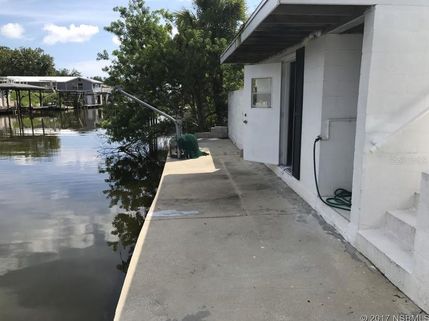 Deep Water Canal Home Close To Intracoastal deep water canal, boat dock, boat house. great fishing, kayaking and boating. this well maintained 2bedroom, 2bath home is move in ready. lovely screened porch overlooks canal. plenty of parking for boat and/or rv. required first month and security only. Applicant's must complete application and provide verification of income. Must also pay for credit and background check. (singles $50 ea., couples $80). NO SMOKING. WILL CONSIDER A SMALL PET Rent $1250, Deposit $1050.