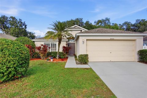 Photo of 30525 Lanesborough Circle, Wesley Chapel, FL 33543 (MLS # TB8457759)