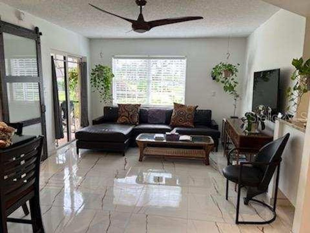 Photo of 19505 Quesada Avenue #N101, Port Charlotte, FL 33948 (MLS # C7522533)