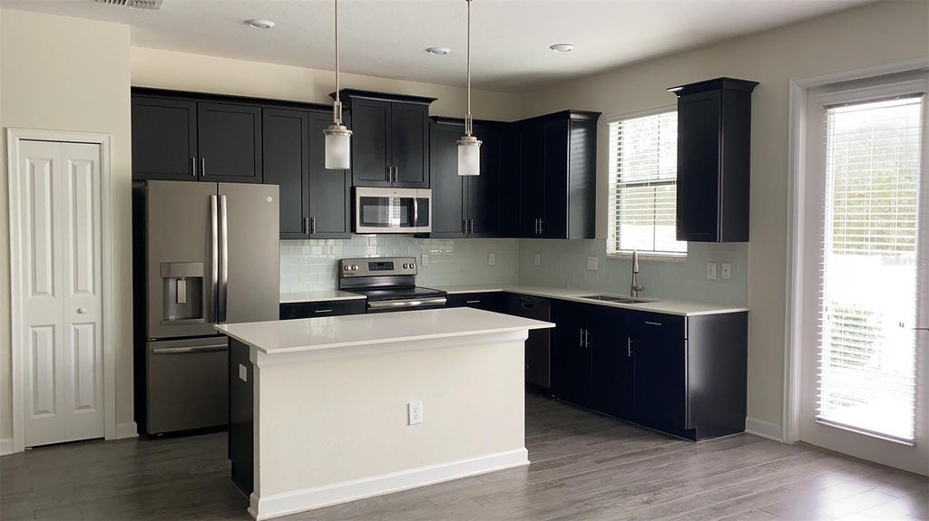 Photo of 11216 Whistling Pine Way, Orlando, FL 32832 (MLS # O6441289)