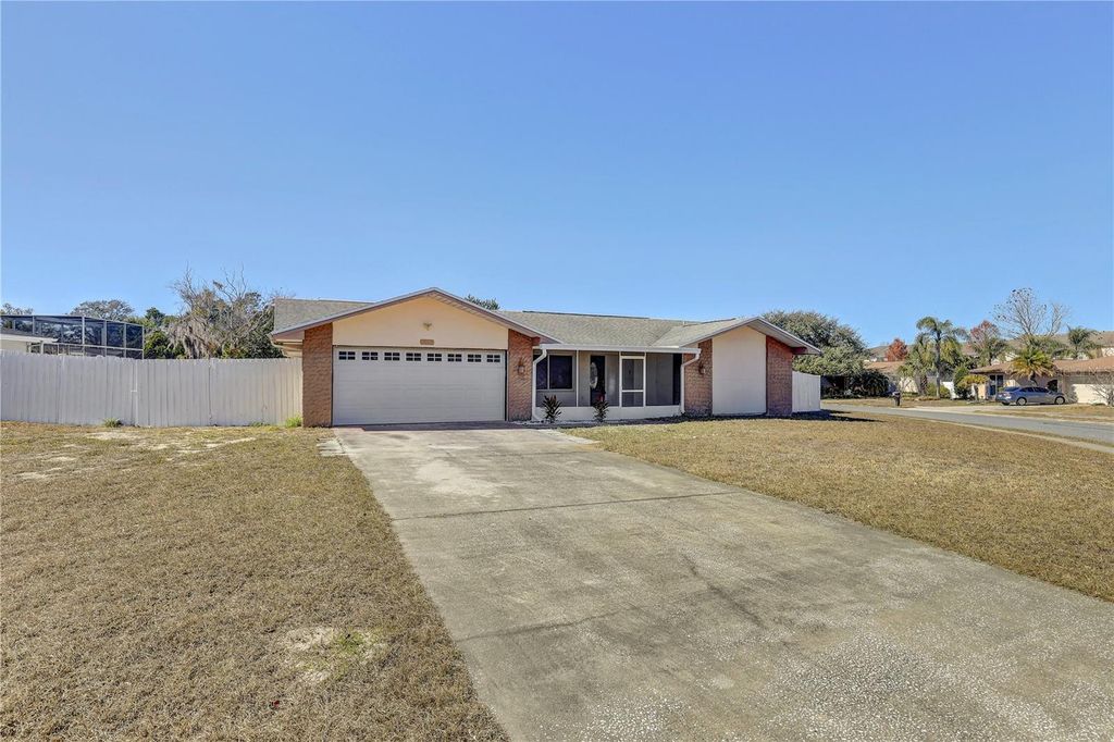 Photo of 7012 Pin Cherry Lane, Port Richey, FL 34668 (MLS # S5148809)