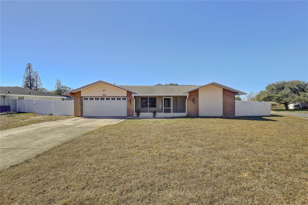 Photo of 7012 Pin Cherry Lane, Port Richey, FL 34668 (MLS # S5148809)