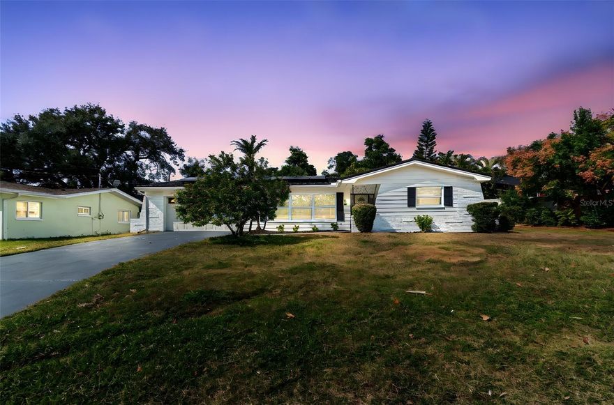 Prime Location! Completely renovated top to bottom, inside and out! The home's refresh is modern with a laid back Florida vibe. The open plan living area features a chef's dream kitchen with generous cabinet space, stone countertops, and eat-in bar. A spacious lanai provides additional space to relax or entertain, overlooking a vinyl fenced backyard. The primary bedroom features an en-suite bath that is truly a spa-like experience, complete with walk in shower and soaking tub. Two other bedrooms share a hall bath featuring dual sinks. The home features solar power - producing your own power helps protect you from rising electricity prices and grid outages! Additionally you'll have peace of mind knowing this home requires no flood insurance. Harbor Hills is highly sought after as one of Largo's most desirable neighborhoods.  It's central to the award winning beaches in Pinellas County, close to the exclusive shops of Belleaire Beach, restaurants to please a variety of palates and budgets. Close to parks, recreational centers, hospitals, gas, groceries, pharmacies, schools, churches, marinas, golf courses, and boat ramps. Enjoy the Florida Life!