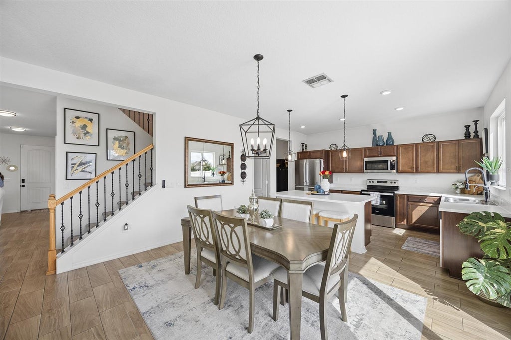 Photo of 143 Summerlin Loop, Haines City, FL 33844 (MLS # O6445751)