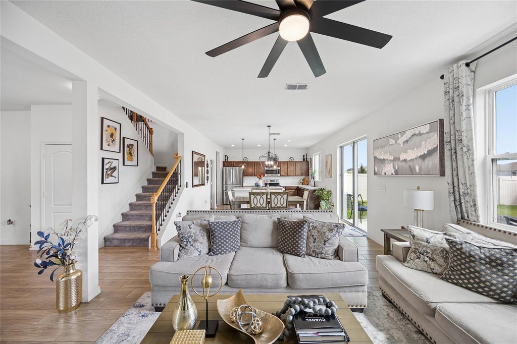 Photo of 143 Summerlin Loop, Haines City, FL 33844 (MLS # O6445751)