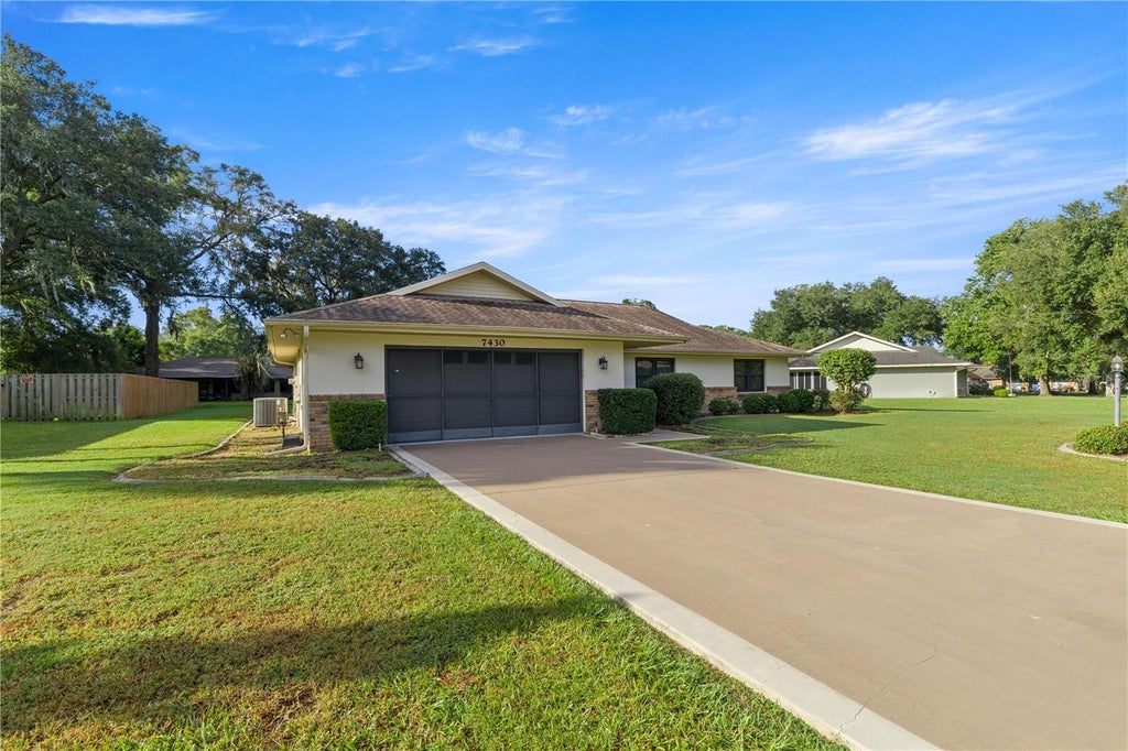 Photo of 7430 SW 100th Place, Ocala, FL 34476 (MLS # OM733344)