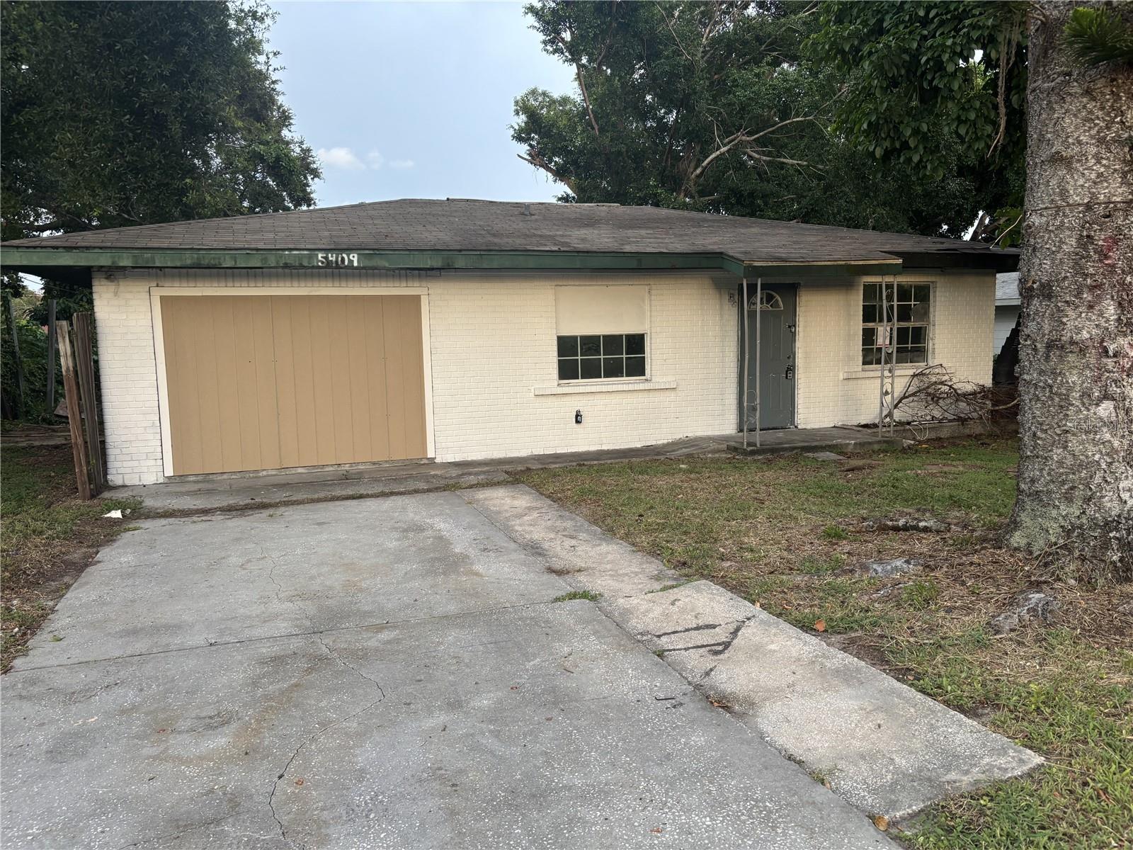 ENORMOUS PRICE REDUCTION TO REFLECT THE WORK REQUIRED! Terrazzo floors and plaster walls! Needs new roof. Also, there are electrical issues at the panel. Discover the potential in this centrally located, 1072 SF under-roof, 2-bedroom, 2-bath home nestled on a quiet dead-end street in Bradenton. Just minutes from downtown Bradenton, I-75, and Sarasota, this property offers unbeatable convenience with room to add value. Originally a 2-bedroom, 1-bath home, the garage may be converted into additional living space, and a second bathroom has been added (permitted status unknown, buyer to verify). The flexible layout provides numerous renovation options. This property needs work. Sold as-is. Bring your toolbox and imagination—the possibilities are endless. Seller may provide hard money financing to qualified buyers.