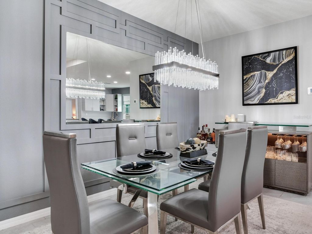 Photo of 9822 Shoreline View Way, Wesley Chapel, FL 33545 (MLS # TB8480625)