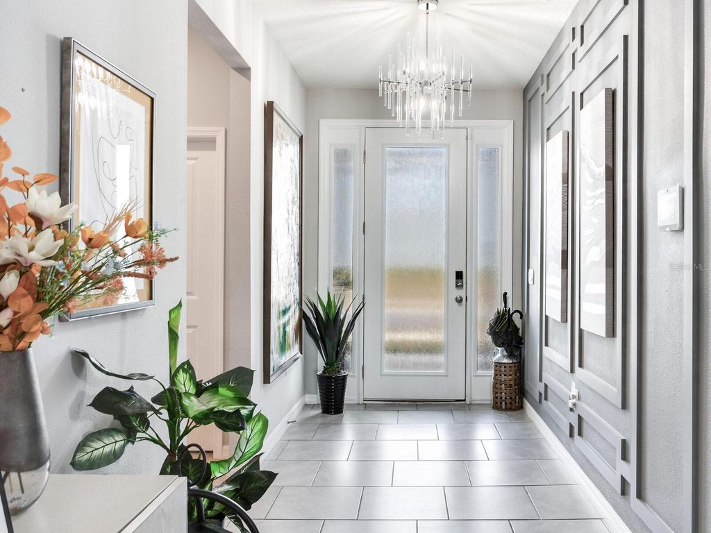 Photo of 9822 Shoreline View Way, Wesley Chapel, FL 33545 (MLS # TB8480625)