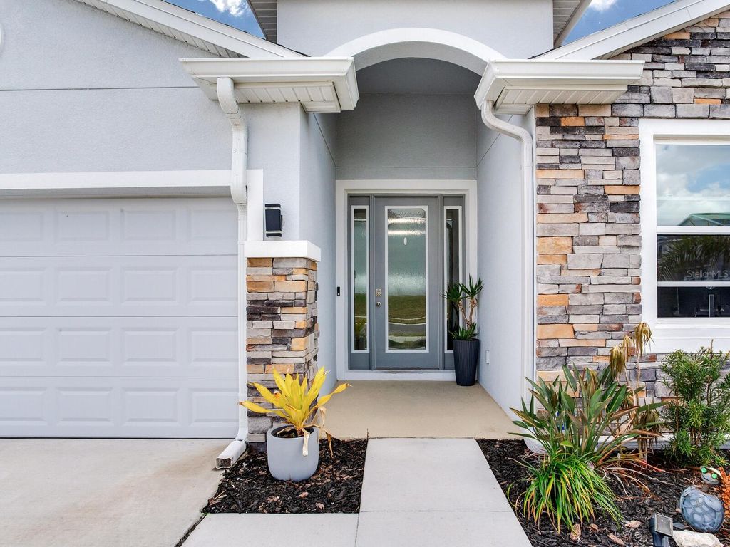 Photo of 9822 Shoreline View Way, Wesley Chapel, FL 33545 (MLS # TB8480625)