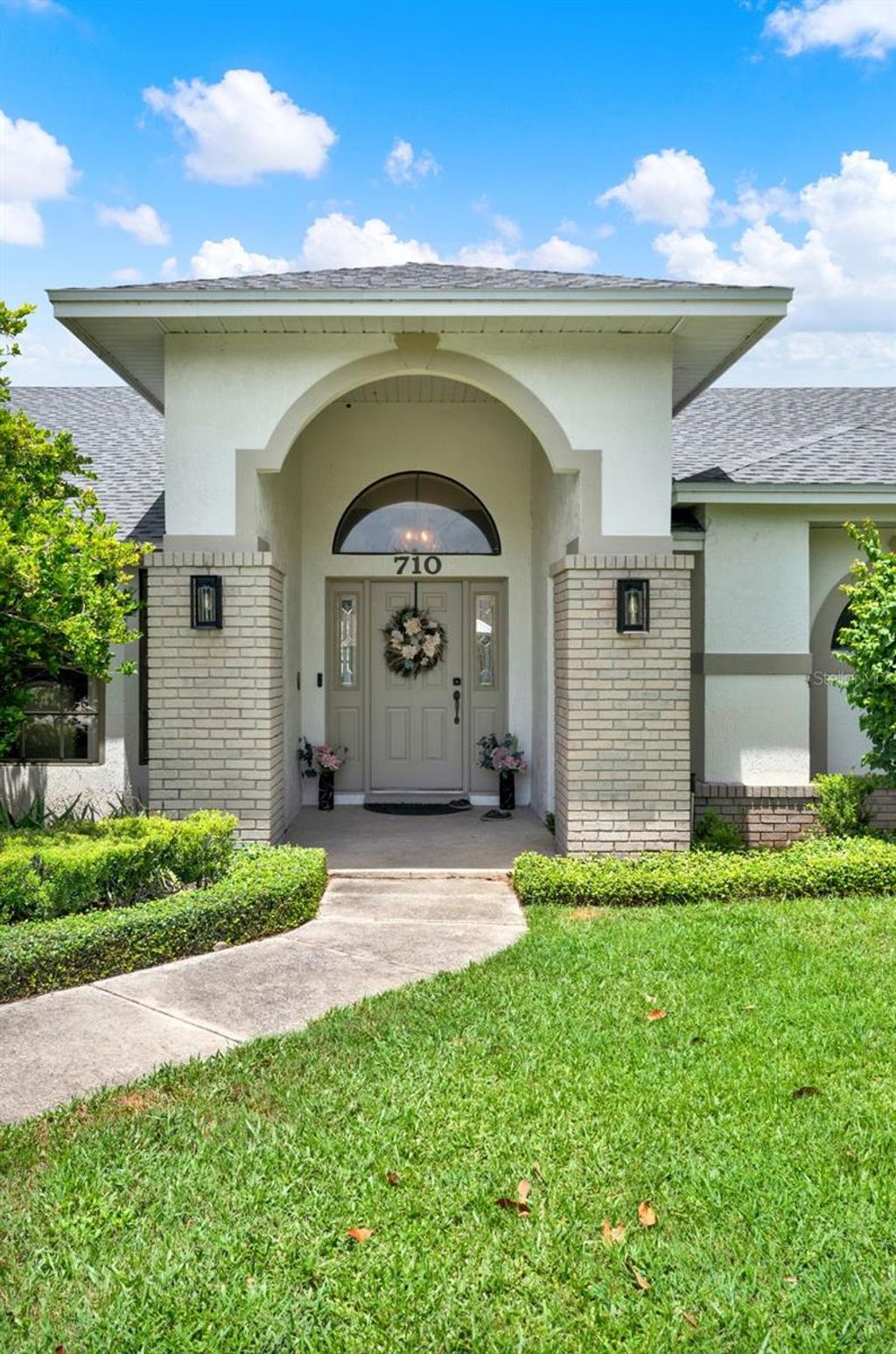 Photo of 710 Heritage Drive NE, Winter Haven, FL 33881 (MLS # P4935620)