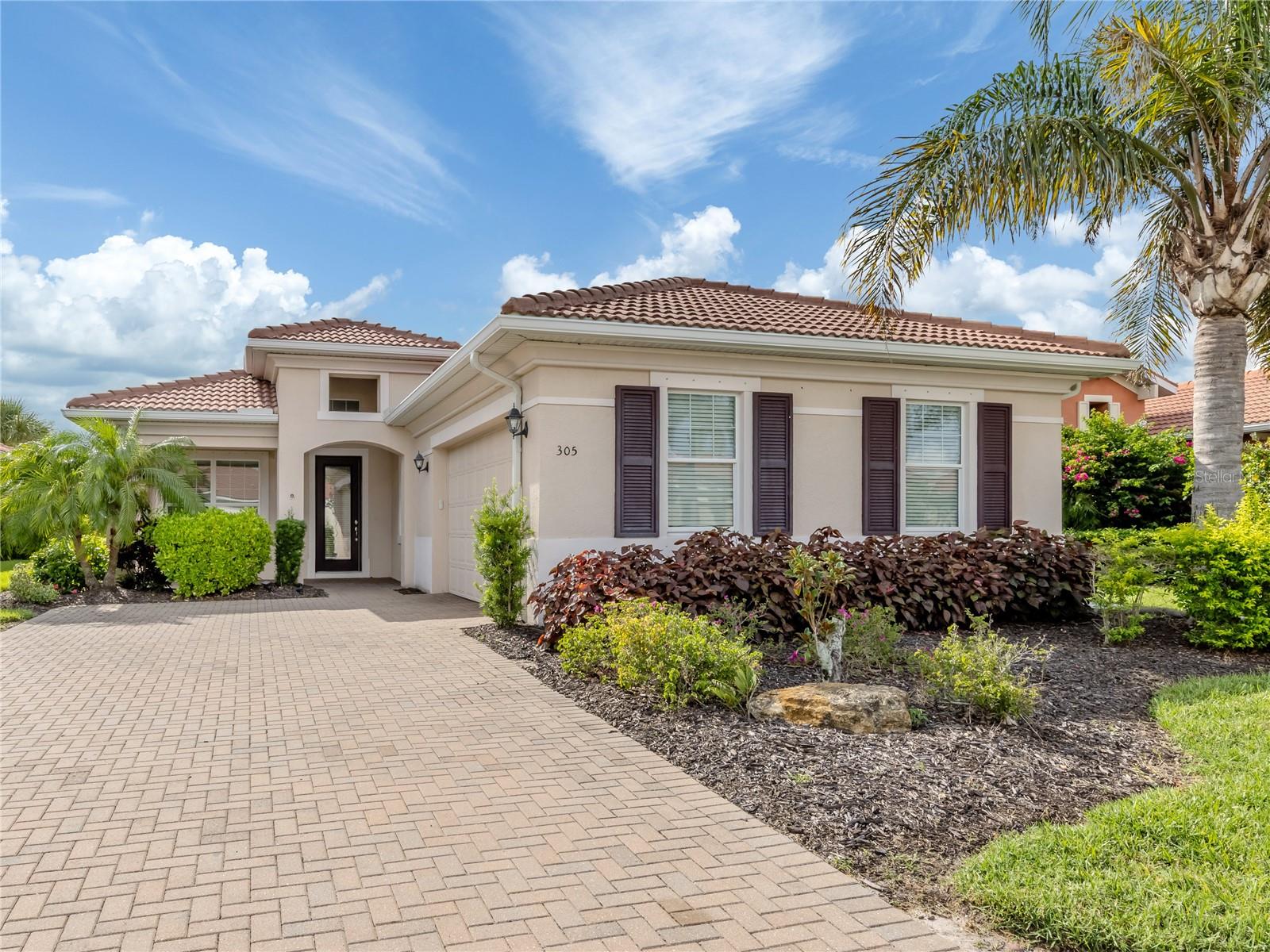 One or more photo(s) has been virtually staged. Charming two-bedroom plus den home with pond views in the exceptional Venetian Golf & River Club. Welcome to this beautifully maintained two-bedroom, two-bath home with an additional office/den, in the sought-after Venetian Golf & River Club. This bright and sunny residence offers serene views of a peaceful pond, where you can enjoy daily sightings of local wildlife from the comfort of your backyard. The primary suite is a retreat, featuring a spacious walk-in closet with custom built-ins, and a luxurious bath with a soaking tub, separate shower and elegant finishes. The open kitchen is equipped with granite countertops, ideal for entertaining or casual dining. Additional highlights include a one-year-old HVAC system and tankless water heater, abundant natural light throughout, and a flexible office/den space ideal for working from home or hosting overnight guests. In a gated community rich in amenities, residents enjoy access to a private restaurant, resort-style pool, lap pool, tiki bar, six Har-Tru tennis courts, three pickleball courts and a scenic half-mile boardwalk leading to picturesque Myakka River. Optional golf club membership is available for those seeking the ultimate golfing lifestyle. Conveniently near Interstate 75, top-rated medical facilities, grocery stores and just minutes from historic downtown Venice, charming shops and the Gulf beaches. This home offers a blend of comfort, style and resort-style living. Don't miss your opportunity to make it yours!