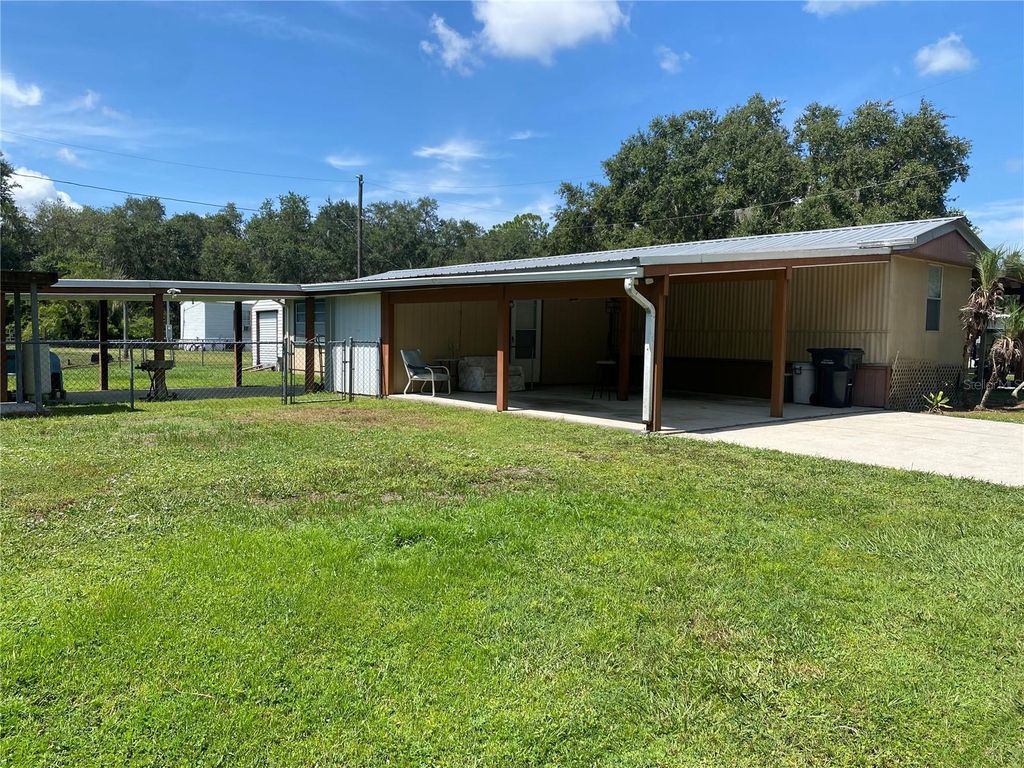 Photo of 13601 Lake Hatchineha Road, Haines City, FL 33844 (MLS # S5132009)