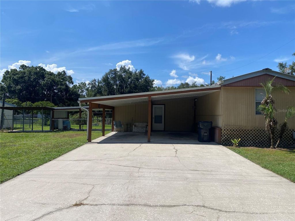 Photo of 13601 Lake Hatchineha Road, Haines City, FL 33844 (MLS # S5132009)
