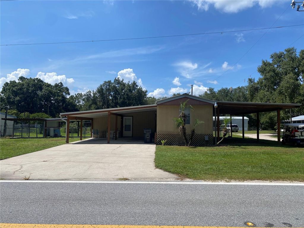 Photo of 13601 Lake Hatchineha Road, Haines City, FL 33844 (MLS # S5132009)