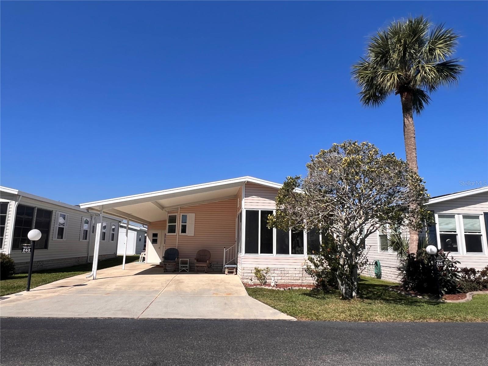 Looking to live the Florida dream in a 55 and over community where you can own your land? Your on the right track!
Welcome to 262 Pine Loop located in Lily Lake Golf & RV Resort! Fully Furnished and priced to sell!
Come by to see this 2 bedroom 2 bath move in ready home. Inside you will find an open layout to relax from a long day of golfing in your community.
The kitchen is equipped with plenty of storage and an island for entertaining with guests while cooking. Dinning area has a beautiful lighted china-hutch perfect for displaying family pictures or your fine china. Bedrooms are equipped with built-in storage closets. Home includes all furniture, appliances, golf cart, washer and dryer (located in an inside closet).
AC was recently replaced in 2021 and roof was replaced in 2012 with 30 year architectural shingles.
Outdoors you will find a car covered carport, golf cart (comes with home), and a storage room.
Lily Lake is the place to be: a beautifully maintained 55+ gated community, a 9-hole golf course, community pool and much more!
The golf course is owned by the residents. Ownership of shares allows you to have voting rights, golfing discounts, and to attend the golf course meetings. Lily Lake displays pride of ownership from the time you enter the gated community. Some of the amenities included in the HOA are having your lawn mowed, basic cable TV/internet, and garbage disposal. The clubhouse is a great meeting place that offers planned activities during most of the year. There is a pool, pickle ball courts, and much more!
PACK YOUR BAGS, YOUR GOLF CLUBS, YOUR SWIM SUIT, & "COME ON DOWN!"
Don't Waste Time!! Schedule your appointment today!