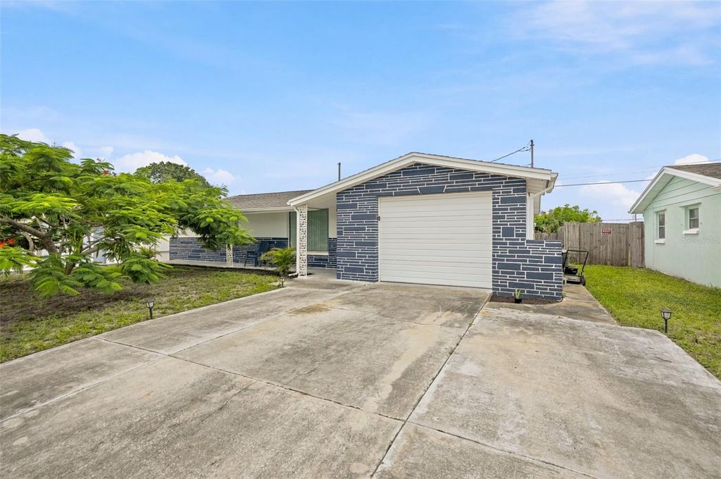 Photo of 5334 Casino Drive, Holiday, FL 34690 (MLS # W7887975)