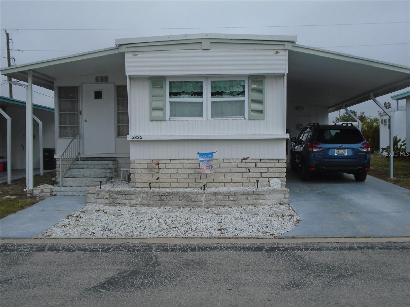 Comfortable * Affordable * Beachway Park and Gulfport * Enter thru the covered Carport Side Door to a Unique Entry Vestibule that Opens to the Large Combination Living Room, Florida / Family Room that are both Open to the Front Facing Eat-In Kitchen...giving that Open Floor Plan many are looking for! The updated Kitchen has Space for the Breakfast Table by the Wall of Windows. The Kitchen Ceiling, Walls and Living Room Ceiling are Drywalled, No Paneling. The home comes Furnished including the Queen Sleeper Sofa for guests (in addition to the second guest bedroom). Nice Wood Look Vinyl in the Living Room extends into the Oversized Primary bedroom (20' Long!) for a cohesive look. The Primary has Two Large Closet / Built-in storage Areas. The Updated Hall Bath with Tub / Shower Combo has a Large Vanity with Lots of Storage Underneath. Beachway Park has a refurbished Pool /Spa / Sundeck area, Shuffleboard, Clubhouse and an Onsite Laundry. The Pinellas Bike Trail is just one street over. It is a short bike ride to the Gulfport Beach area Restaurants, Library, Senior Centre, Performing Arts Theatre and Public Fishing Pier. Beachway Park and Gulfport...a Nice Place to Live at an Affordable Price? No Pets * No Annual Rentals * Over 55